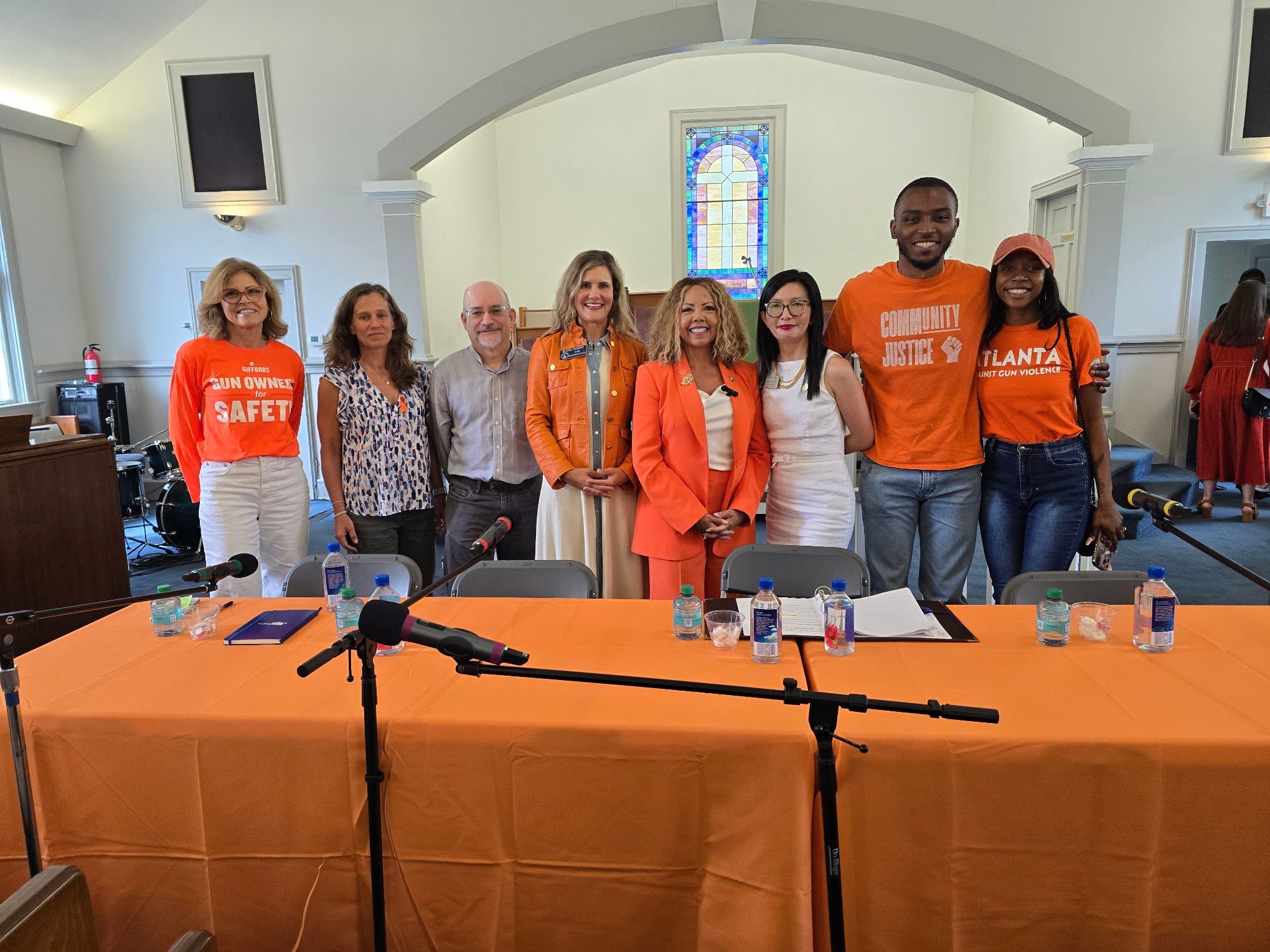 People standing at a table